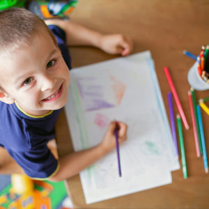 Boy, drawing a picture for fathers day